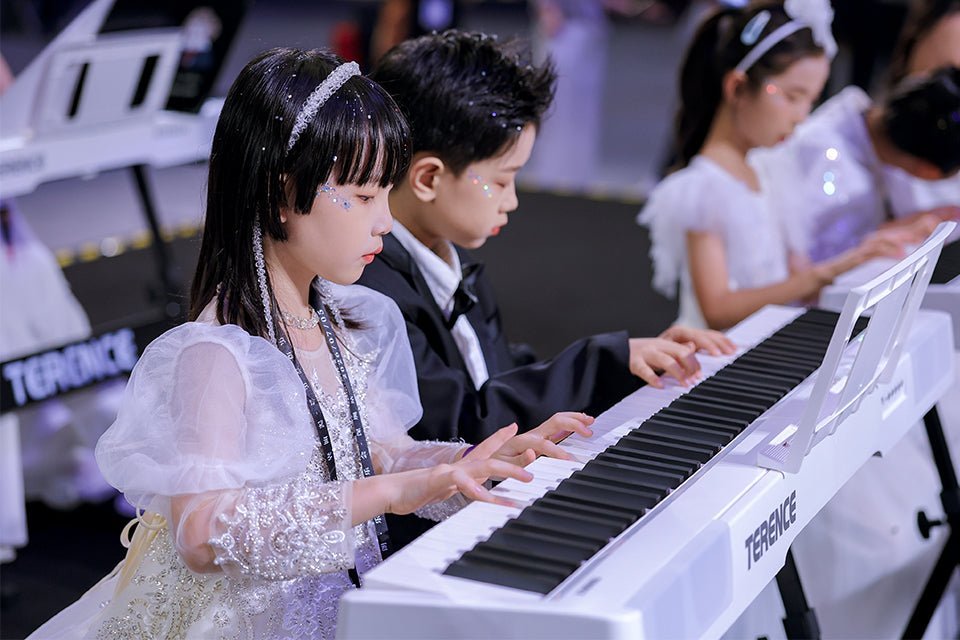 Young musicians performing together on white TERENCE digital pianos
