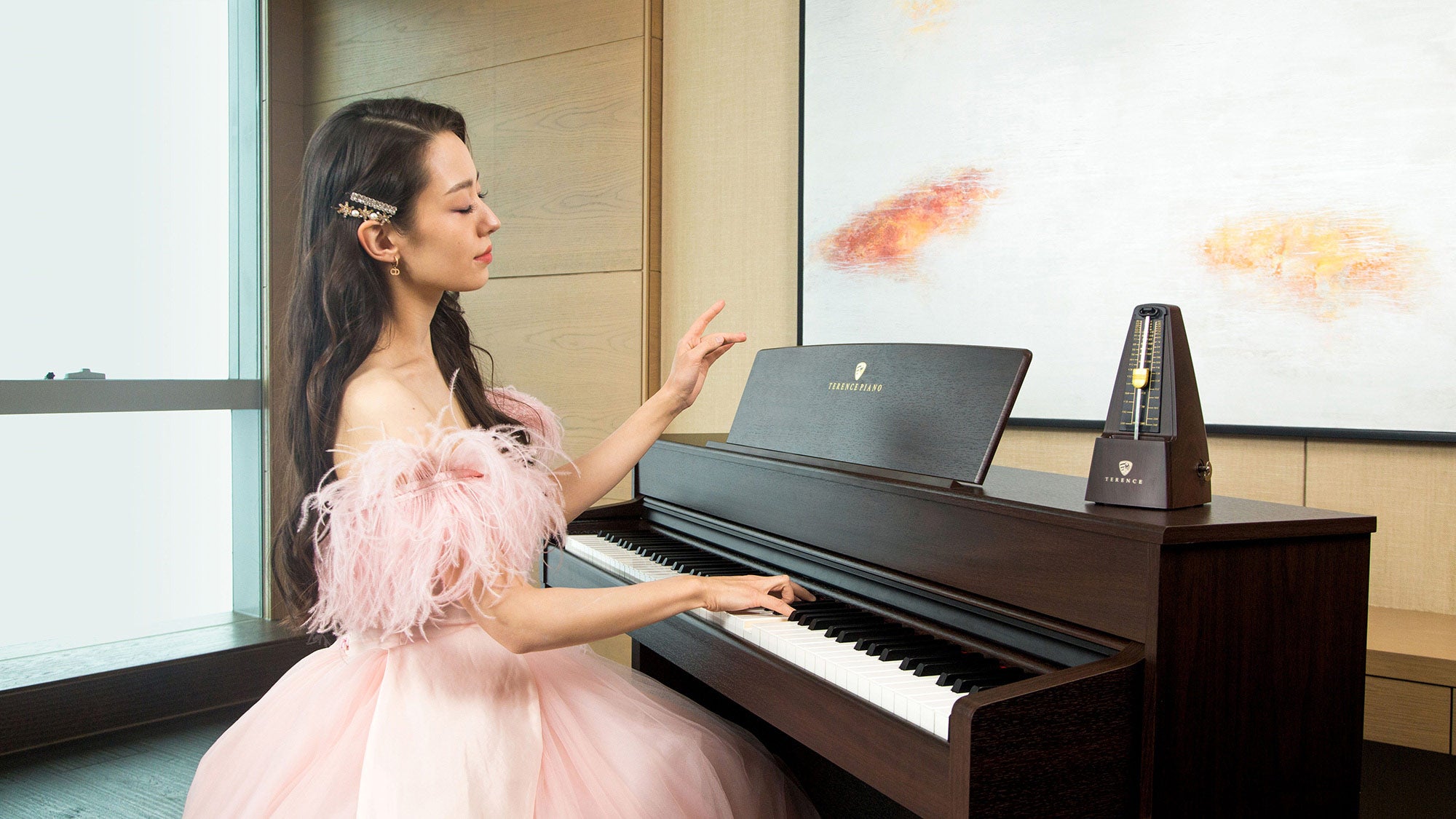 Gina Alice, TERENCE brand ambassador, playing a TERENCE piano